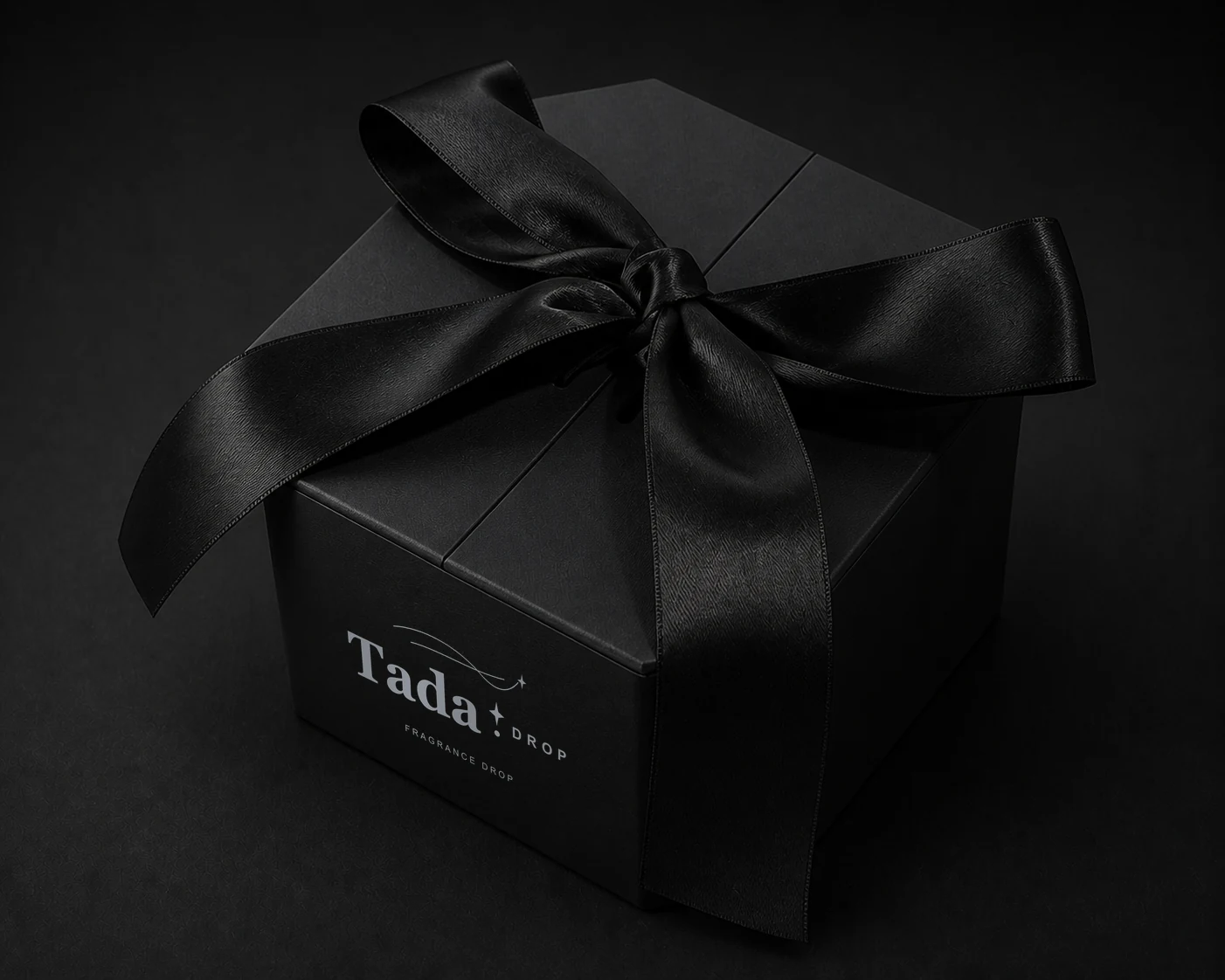 TadaDrop Fragrance Drop wrapped in black satin ribbon